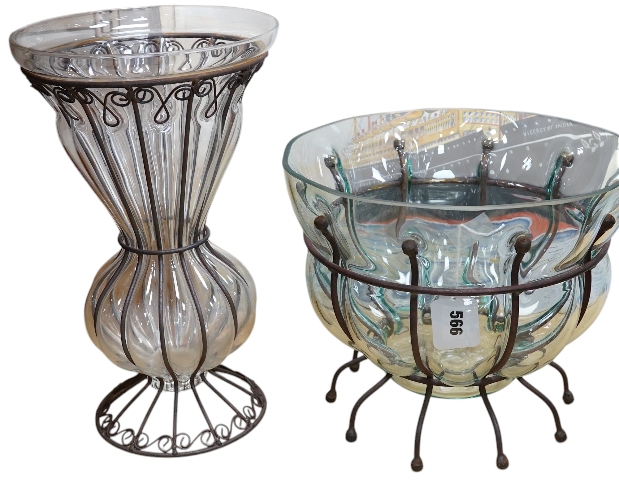 A glass vase and a similar bowl with wrought iron stand, vase 38cm high. Condition - good